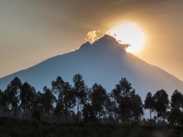 Sunrise behind Mount Mikeno, Virunga National Park, Democratic Republic of Congo (formerly Zaire), Africa