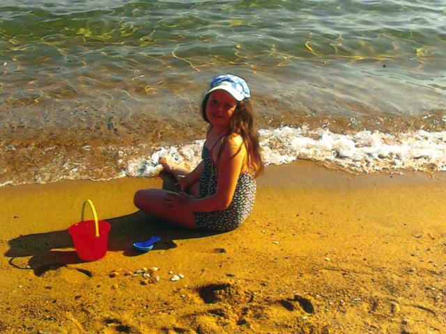 Olivia Violet Sunshine at the beach