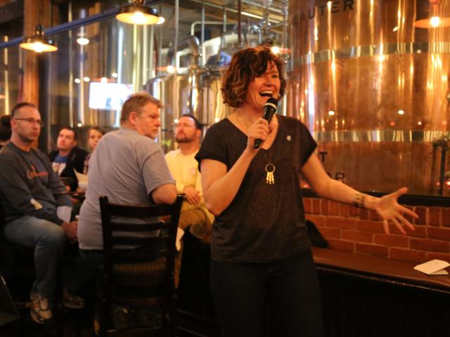 A lady hosting an event