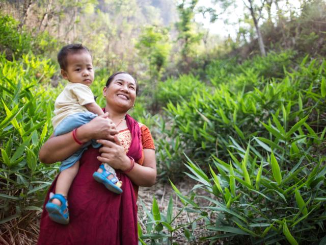 Portrait of Harigala Almathir and her son in the Abukhairani municipality ward n. 9, of Amdandabeshi, Nepal. 