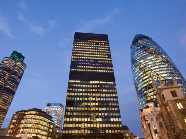 The Swiss Re Tower and other buildings in the City of London, UK.