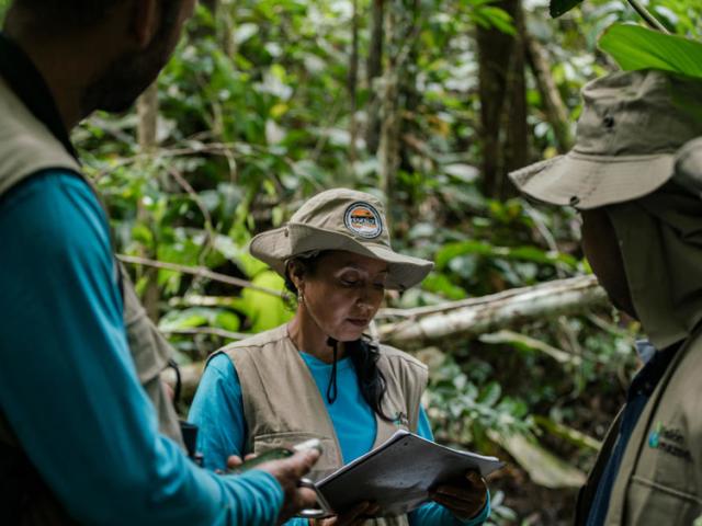 A group of local community leaders and 'environmental promoters' conduct an environmental survey of the forest on the farm of Marco Aurelio Zapata