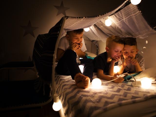 Boys in a homemade tent