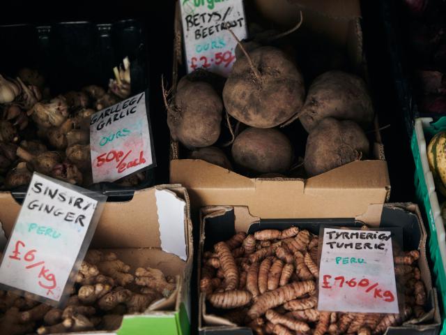 Produce for sale at Tyddyn Teg farm shop; including garlic, ginger, beetroot and turmeric.