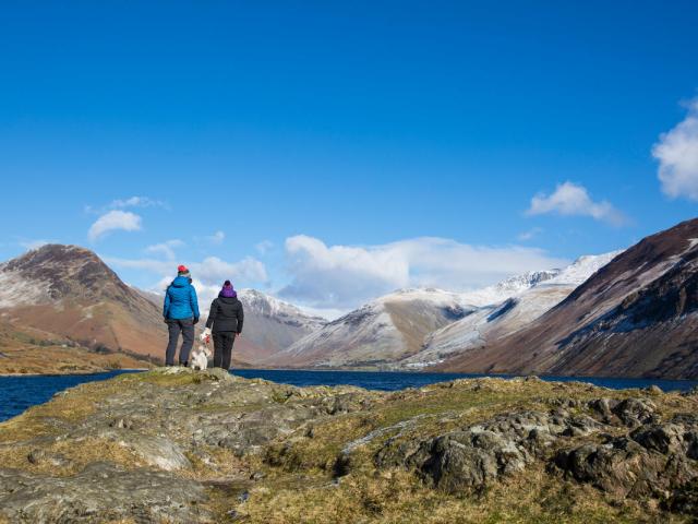 Members of the public enjoying the view on a walk around Wast Water, Lake District, UK