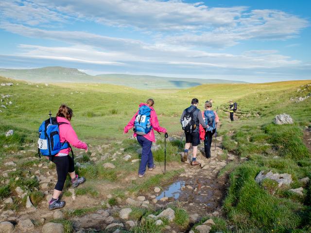Hikers doing the Yorkshire Three Peaks challenge