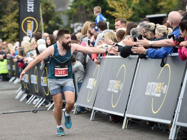 Scottish Half runner and cheerers