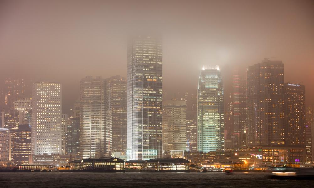 Office blocks lit up at night in Hong Kong