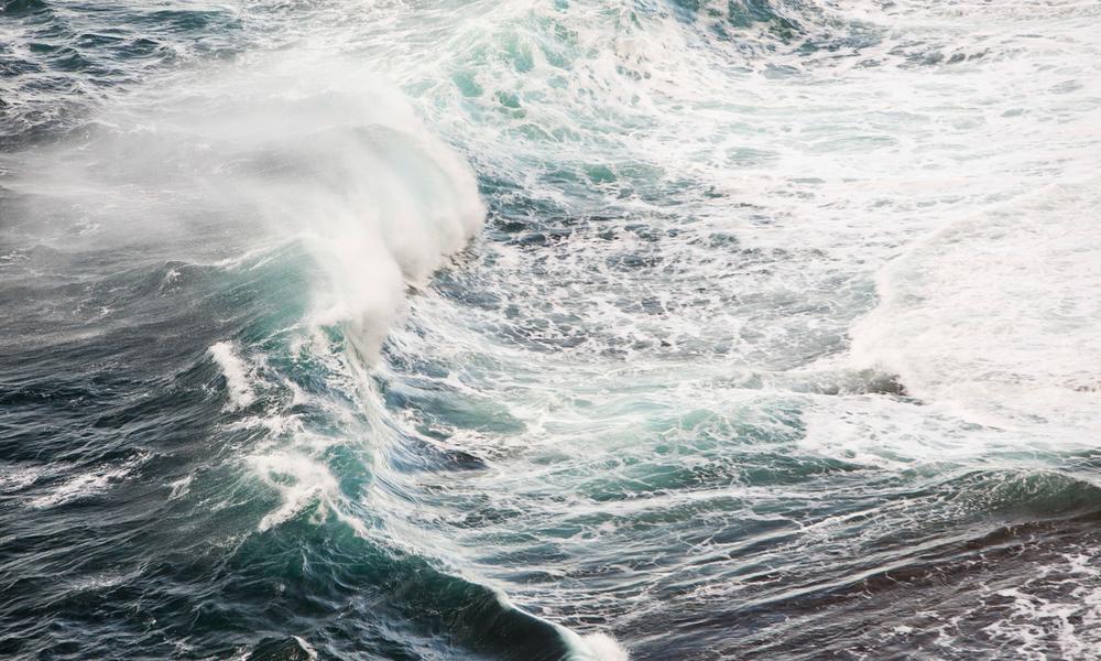 Waves crashing off Orkney in Scotland, UK. Orkney is leading the way in the testing of both tidal and wave energy devices.