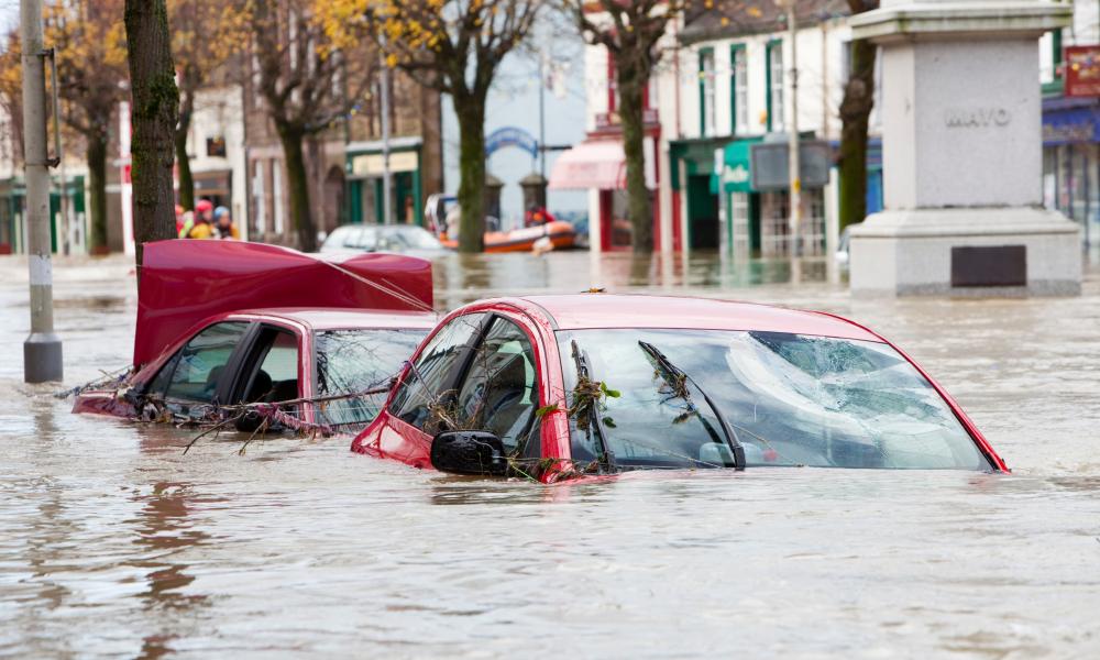Flooded car on Cockermouth Main Street, UK