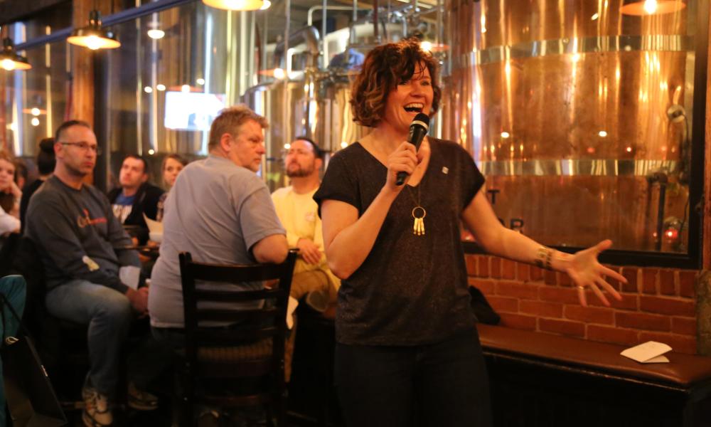 A lady hosting an event
