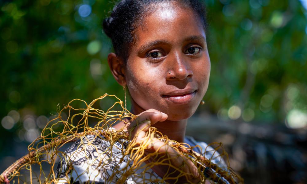 A fishing woman in a village set among mangroves in the western coastal region of Madagascar. 