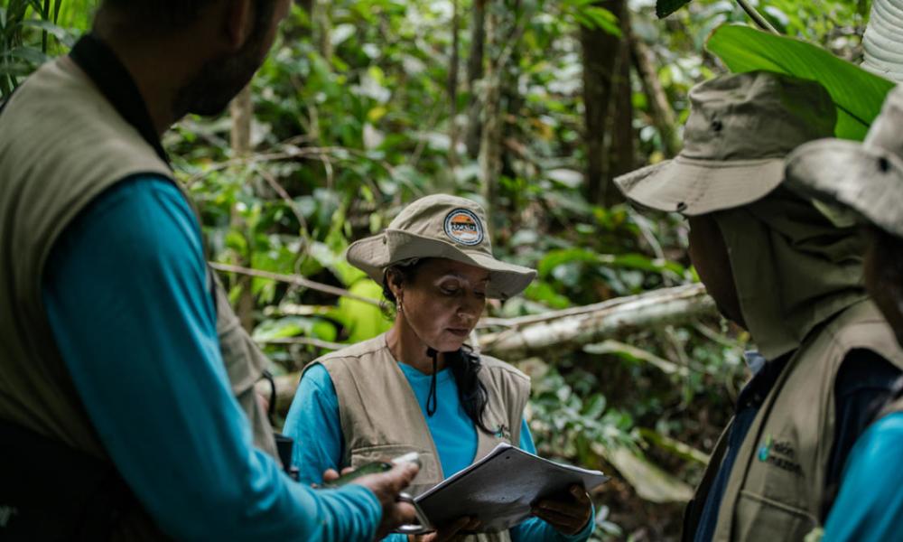 A group of local community leaders and 'environmental promoters' conduct an environmental survey of the forest on the farm of Marco Aurelio Zapata