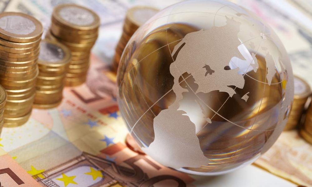 Currency and money on the table representing global investment and finance.
