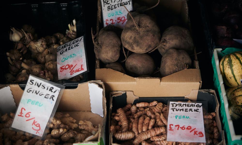 Produce for sale at Tyddyn Teg farm shop; including garlic, ginger, beetroot and turmeric.