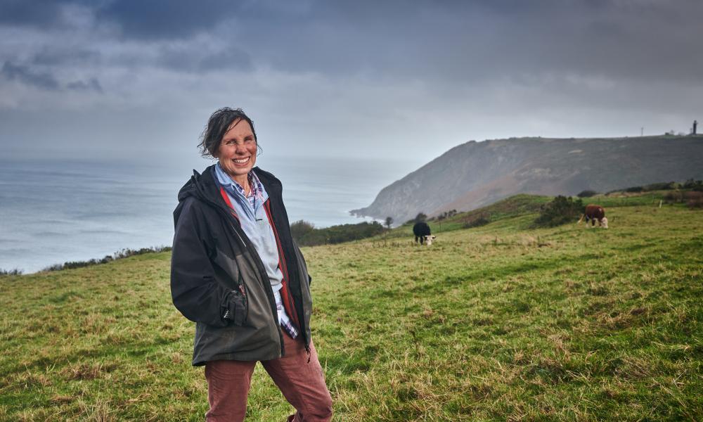 Liz on farmland close to the coast, Nantlyd farm.