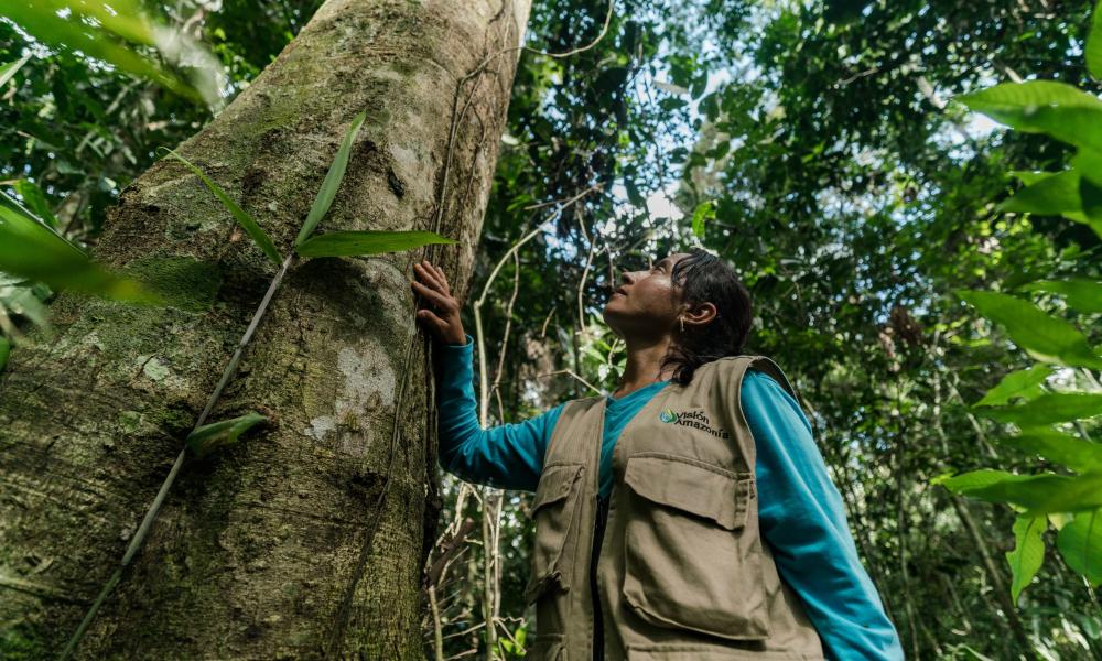 Marisela Silva Parra, local community leader and 'environmental promoter' conducting environmental survey of the forest found on a local farm.
