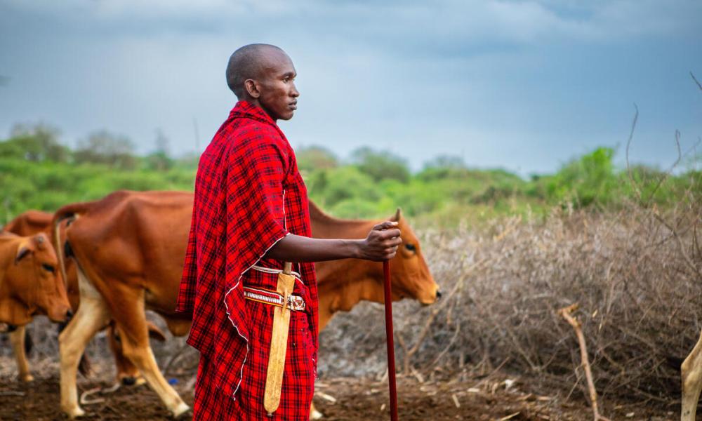 Portrait of age group chief Taporu Lemanyi while standing in his boma. Embirika, Kajiado county, Kenya.