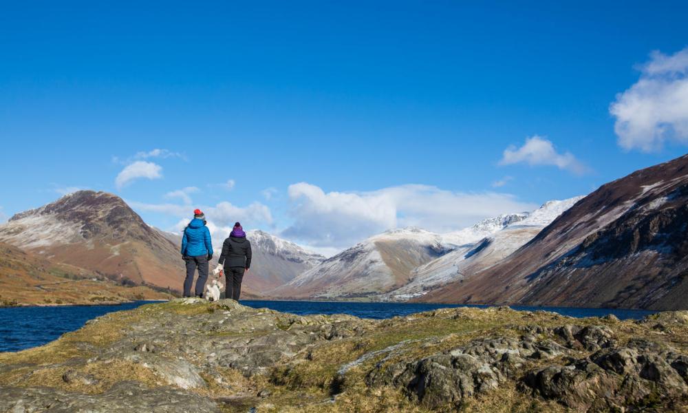 Members of the public enjoying the view on a walk around Wast Water, Lake District, UK