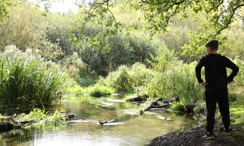Families and children take part in an Aviva Access to Nature Fund visit along the River Nar, Norfolk.
