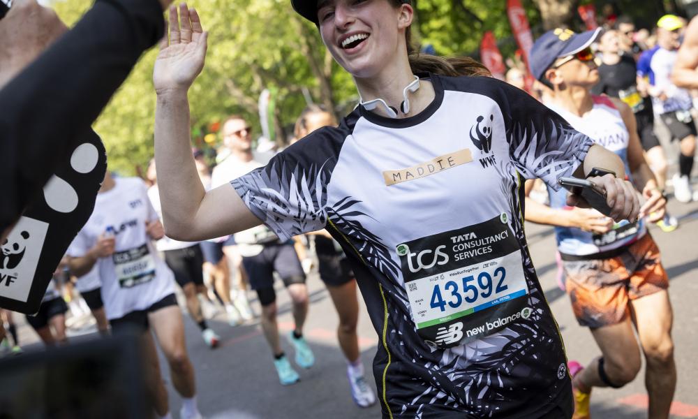 A WWF Runner smiling at the London Marathon