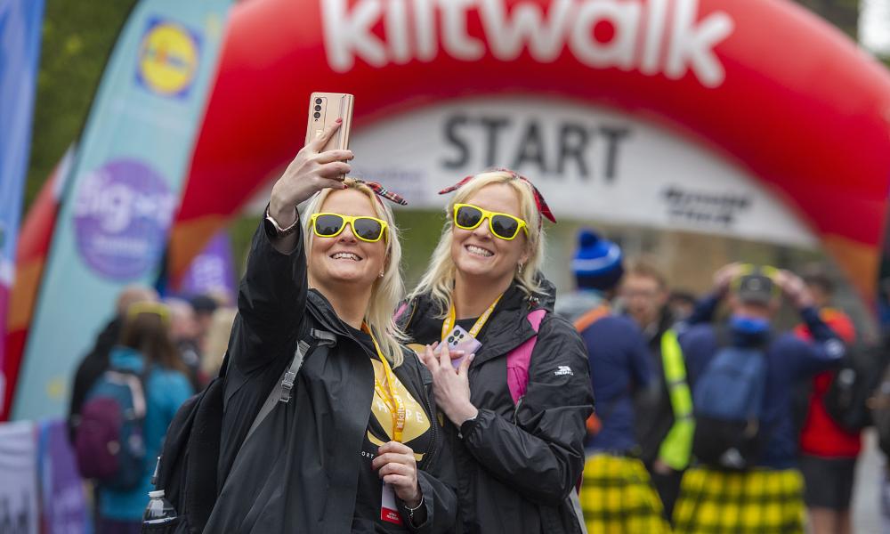 Two walkers in front of start gantry