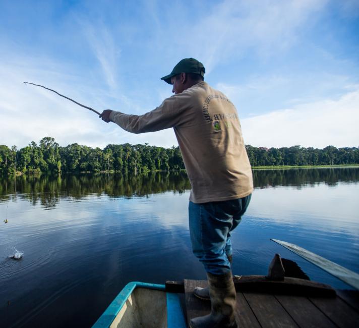 Segundo fishes for Pirana on lake Sandoval, the Amazon