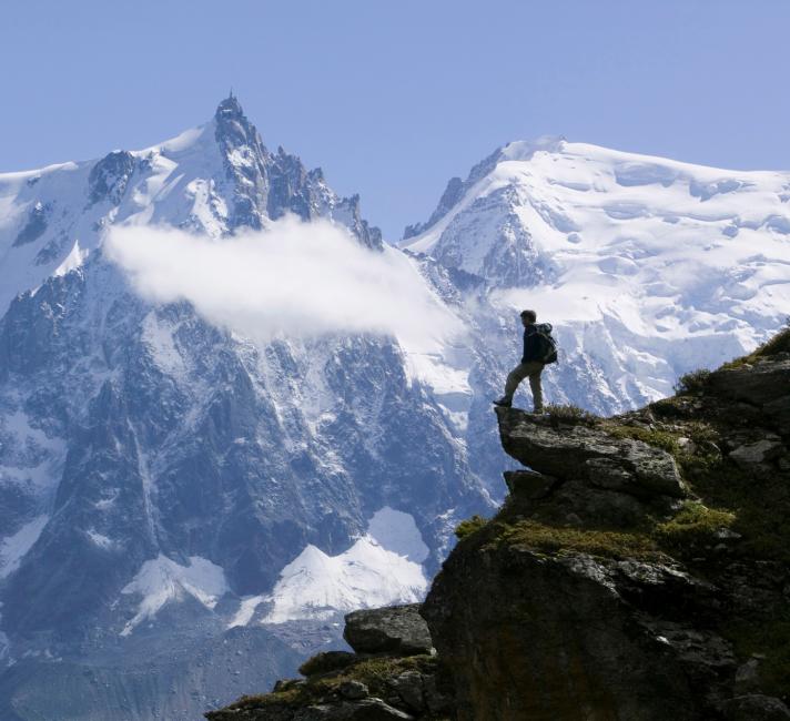 A Mountaineer approaching the summit of the Brevent in front of Mont Blanc