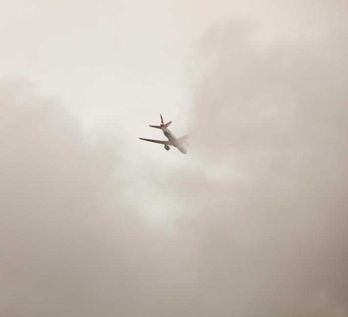 A plane flying into cloud over London