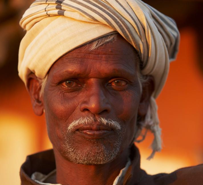 Portrait of a local man with turban in village Bagaspur, Madhya Pradesh, India.
