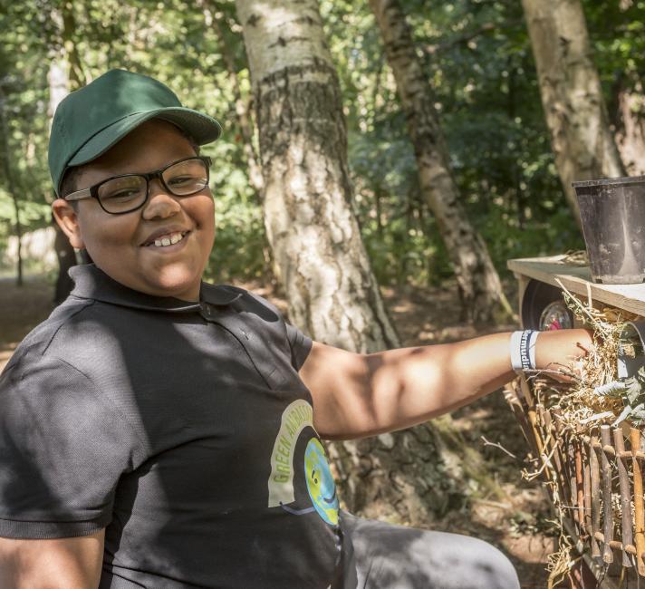 Green Ambassadors creating a bug house © Richard Stonehouse / WWF-UK