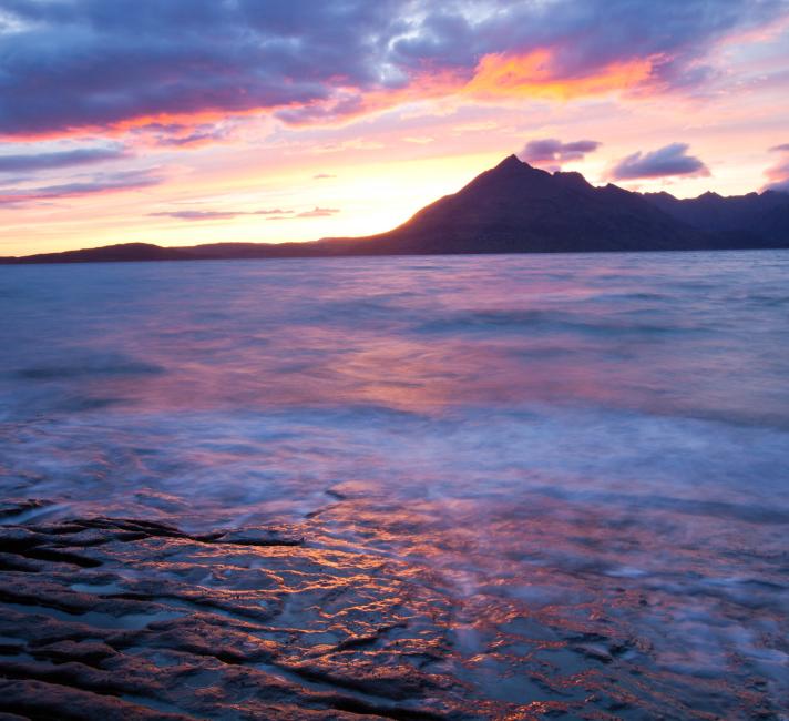 The Cuillin Ridge on the Isle of Skye, Scotland, UK, from Elgol, at sunset. The Cuillin Ridge on the Isle of Skye, Scotland, UK, from Elgol, at sunset.