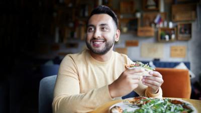 Man eating burger