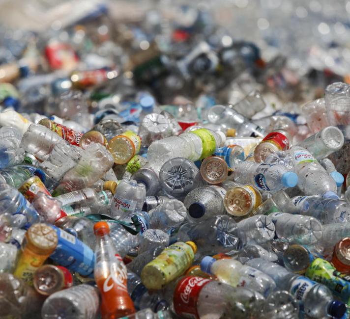 Plastic bottles at landfill site - South Jakarta  - © WWF / Yunaidi Joepoet