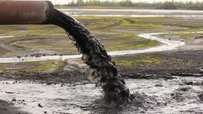 Dirty water discharged into river via a pipe