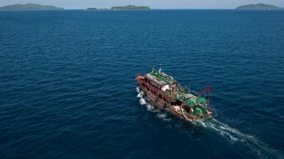 Aerial of a Danish seine at work. Commercial fishing illegally within municipal waters. 