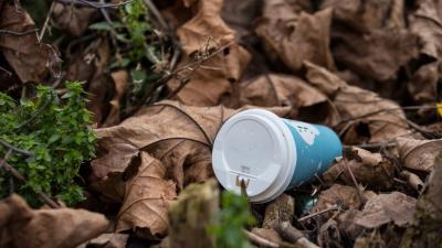 Discarded disposable coffee cups litter the streets in London, Elizabeth Dalziel