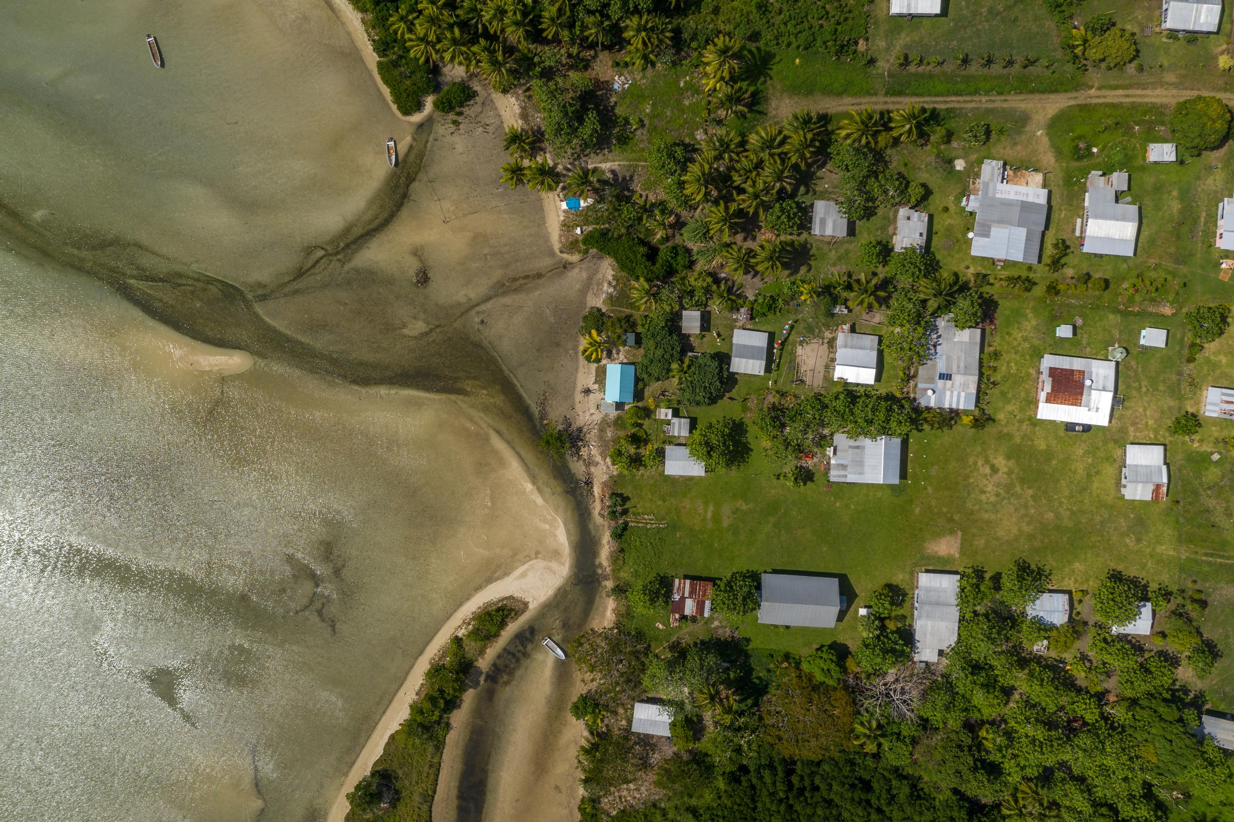 Aerial shot of the tide coming in at Raviravi village
