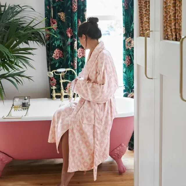 Woman running a bath