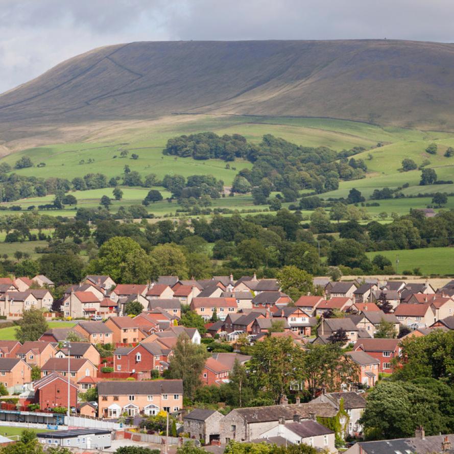 Houses on the outskirts of Clitheroe, Lancashire, UK, looking towards the surrounding countryside and Pendle Hill.