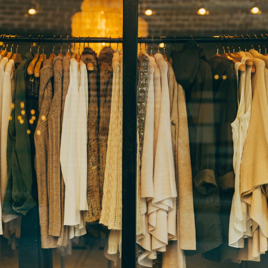 Rail of clothing in neutral tones