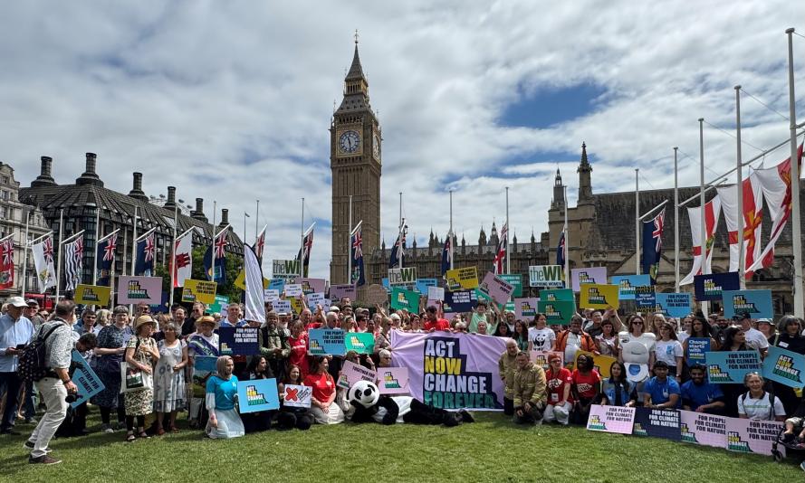 WWF supporters and climate campaigners in front Parliament as part of 2025 Mass Lobby
