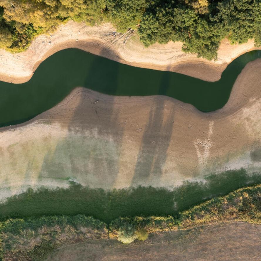 Aerial of reservoir low levels Derbyshire UK