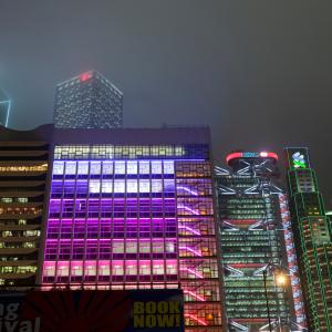 Office blocks lit up at night in Hong Kong, China.