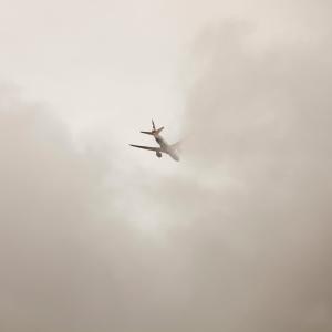 A plane flying into cloud over London