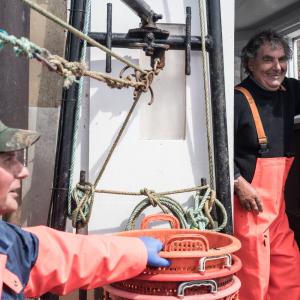 Fishermen on a boat off the Scottish coast