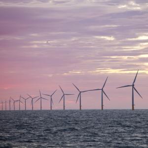 The Walney Offshore windfarm project, off Barrow in Furness, Cumbria, UK, at sunset. 