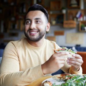 Man eating burger