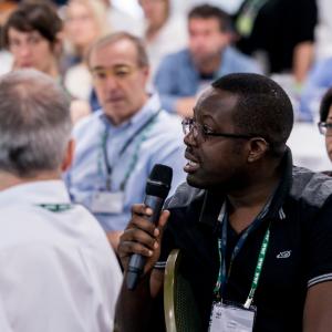 Nyambe Nyambe asks a question during the WWF Assembly meeting