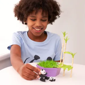 Girl playing with Wild Scenes Grow and Play - Pandas' Bamboo Forest